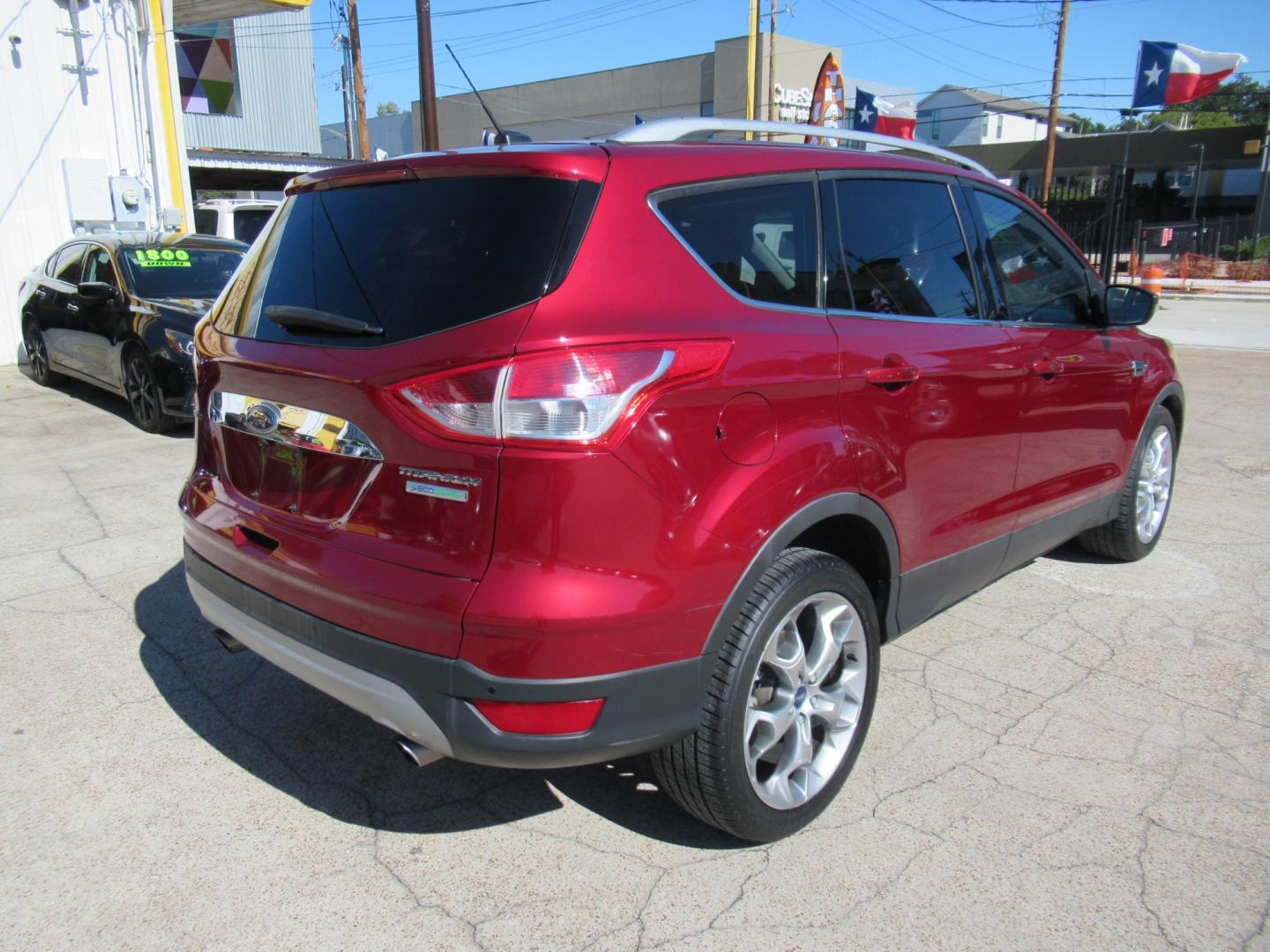 2014 Red /Black Ford Escape Titanium (1FMCU0J98EU) with an 2.0 engine, Automatic transmission, located at 1511 North Shepherd Dr., Houston, TX, 77008, (281) 657-1221, 29.798361, -95.412560 - 2014 FORD ESCAPE TITANIUM VIN: 1FMCU0J98EUA29272 1 F M C U 0 J 9 8 E U A 2 9 2 7 2 4 DOOR WAGON/SPORT UTILITY 2.0L I4 F DOHC 16V GASOLINE FRONT WHEEL DRIVE - Photo#15